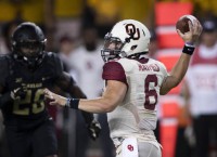 No. 3 Sooners rally to defeat Baylor 49-41