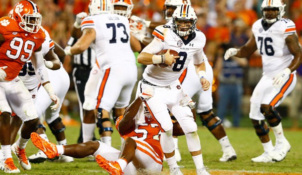 Sep 9, 2017; Clemson, SC, USA; Auburn Tigers quarterback Jarrett Stidham (8) tries to avoid the sack by Clemson Tigers linebacker Tre Lamar (57) during the third quarter at Clemson Memorial Stadium. Photo Credit: Jeremy Brevard-USA TODAY Sports