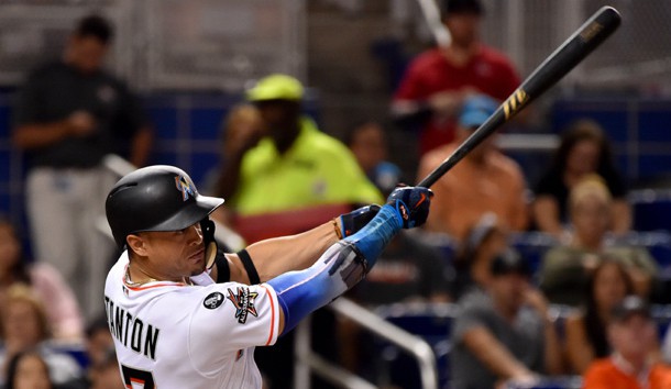 Sep 18, 2017; Miami, FL, USA; Miami Marlins right fielder Giancarlo Stanton (27) connects for an RBI single in the fifth inning against the New York Mets at Marlins Park. Photo Credit: Steve Mitchell-USA TODAY Sports