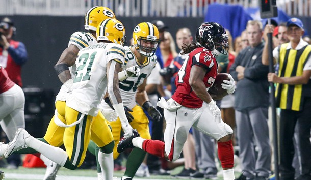 Sep 17, 2017; Atlanta, GA, USA; Atlanta Falcons running back Devonta Freeman (24) runs the ball against the Green Bay Packers in the third quarter at Mercedes-Benz Stadium. Photo Credit: Brett Davis-USA TODAY Sports