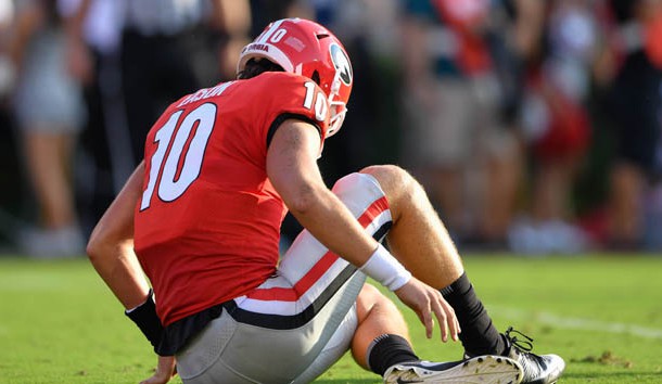 Sep 2, 2017; Athens, GA, USA; Georgia Bulldogs quarterback Jacob Eason (10) falls after being injured against the Appalachian State Mountaineers during the first quarter at Sanford Stadium. Photo Credit: Dale Zanine-USA TODAY Sports