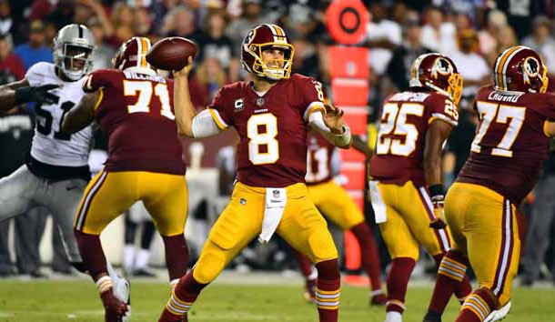 Sep 24, 2017; Landover, MD, USA; Washington Redskins quarterback Kirk Cousins (8) drops back to pass against the Oakland Raiders during the first half at FedEx Field. Mandatory Credit: Brad Mills-USA TODAY Sports
