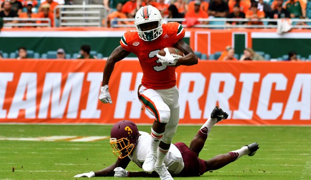 Sep 2, 2017; Miami Gardens, FL, USA; Miami Hurricanes wide receiver Mike Harley (3) runs past Bethune Cookman Wildcats cornerback Jamaal Burgess (3) during the first half at Hard Rock Stadium. Photo Credit: Steve Mitchell-USA TODAY Sports