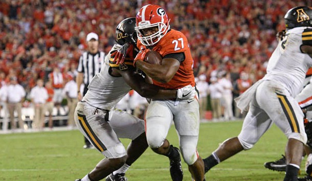 Sep 2, 2017; Athens, GA, USA; Georgia Bulldogs running back Nick Chubb (27) breaks a tackle by Appalachian State Mountaineers defensive back Josh Thomas (7) to score a touchdown during the second half at Sanford Stadium. Photo Credit: Dale Zanine-USA TODAY Sports