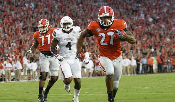 Sep 23, 2017; Athens, GA, USA; Georgia Bulldogs running back Nick Chubb (27) runs for a touchdown against the Mississippi State Bulldogs during the first quarter at Sanford Stadium. Mandatory Credit: Dale Zanine-USA TODAY Sports