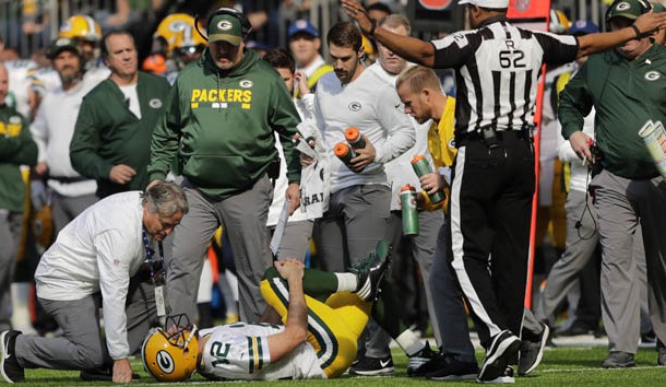 Oct 15, 2017; Minneapolis, MN, USA; Green Bay Packers quarterback Aaron Rodgers (12) holds his knee after getting injured in the first quarter during their football game against the Minnesota Vikings at U.S. Bank Stadium. Photo Credit: Dan Powers/Appleton Post Crescent via USA TODAY Sports