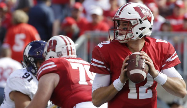Sep 30, 2017; Madison, WI, USA; Wisconsin quarterback Alex Hornibrook (12) looks for an open receiver during the first quarter of their game at Camp Randall Stadium. Wisconsin beat Northwestern 33-24. Photo Credit: Mark Hoffman/Milwaukee Journal Sentinel via USA TODAY Sports