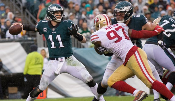 Oct 29, 2017; Philadelphia, PA, USA; Philadelphia Eagles quarterback Carson Wentz (11) passes in front of the rush of San Francisco 49ers linebacker Dekoda Watson (97) during the third quarter at Lincoln Financial Field. Photo Credit: Bill Streicher-USA TODAY Sports