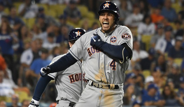 Oct 25, 2017; Los Angeles, CA, USA; Houston Astros center fielder George Springer (4) celebrates his two run home run in the eleventh inning against the Los Angeles Dodgers in game two of the 2017 World Series at Dodger Stadium. Photo Credit: Richard Mackson-USA TODAY Sports