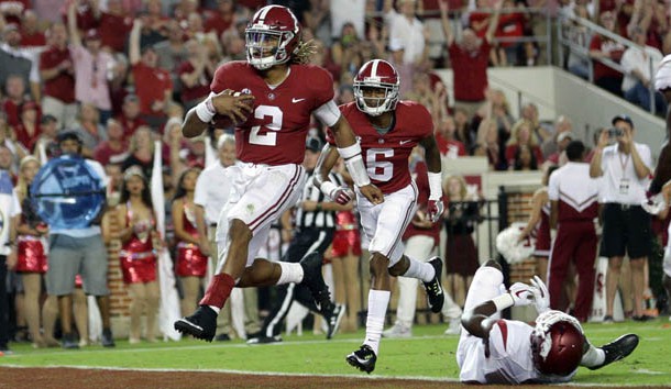 Oct 14, 2017; Tuscaloosa, AL, USA; Alabama Crimson Tide quarterback Jalen Hurts (2) scores a touchdown during the second quarter against Arkansas Razorbacks at Bryant-Denny Stadium. Photo Credit: Marvin Gentry-USA TODAY Sports