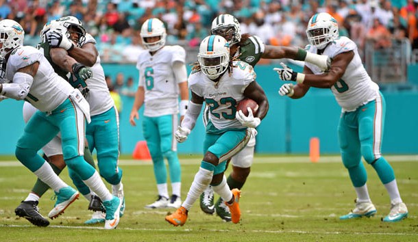Oct 22, 2017; Miami Gardens, FL, USA; Miami Dolphins running back Jay Ajayi (23) runs the ball against the New York Jets during the first half at Hard Rock Stadium. Photo Credit: Jasen Vinlove-USA TODAY Sports