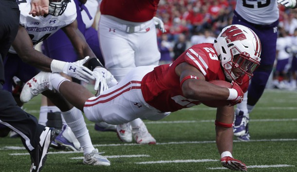 Sep 30, 2017; Madison, WI, USA; Wisconsin running back Jonathan Taylor (23) scores a touchdown on a seven yard run during the first quarter of their game against Northwestern at Camp Randall Stadium. Photo Credit: Mark Hoffman/Milwaukee Journal Sentinel via USA TODAY Sports