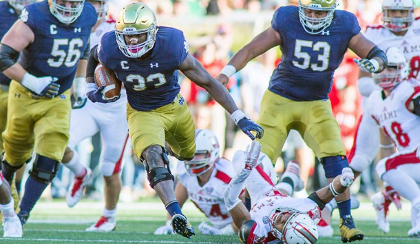 Sep 30, 2017; South Bend, IN, USA; Notre Dame Fighting Irish running back Josh Adams (33) runs the ball in the first quarter of the game against the Miami (Oh) Redhawks at Notre Dame Stadium. Photo Credit: Trevor Ruszkowski-USA TODAY Sports