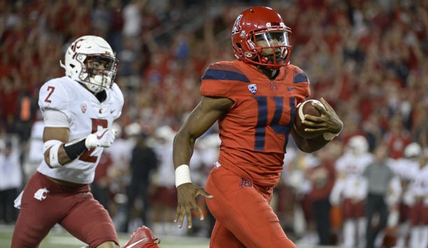 Oct 28, 2017; Tucson, AZ, USA; Arizona Wildcats quarterback Khalil Tate (14) runs the ball for a touchdown under pressure from Washington State Cougars defensive back Robert Taylor (2) during the second half at Arizona Stadium. Photo Credit: Casey Sapio-USA TODAY Sports