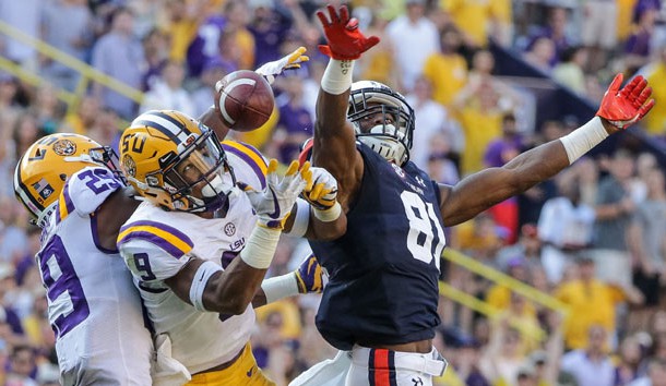 Oct 14, 2017; Baton Rouge, LA, USA; LSU Tigers cornerback Andraez Williams (29) and safety Grant Delpit (9) break up a pass to Auburn Tigers wide receiver Darius Slayton (81) during the second half of a game at Tiger Stadium. LSU defeated Auburn 27-23. Photo Credit: Derick E. Hingle-USA TODAY Sports