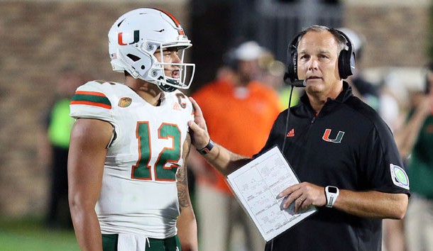 Sep 29, 2017; Durham, NC, USA; Miami Hurricanes head coach Mark Richt talks to quarterback Malik Rosier (12) in the second half against the Duke Blue Devils at Wallace Wade Stadium. Miami beat Duke 31-6. Photo Credit: Mark Dolejs-USA TODAY Sports