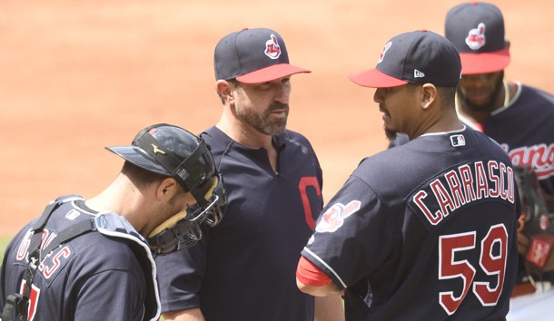 Apr 16, 2017; Cleveland, OH, USA; Cleveland Indians pitching coach Mickey Callaway (32) visits starting pitcher Carlos Carrasco (59) in the third inning at Progressive Field. Photo Credit: David Richard-USA TODAY Sports
