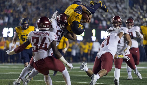 Oct 13, 2017; Berkeley, CA, USA; California Golden Bears quarterback Ross Bowers (3) leaps for a touchdown against Washington State Cougars linebacker Justus Rogers (37) during the second half at Memorial Stadium. Photo Credit: Neville E. Guard-USA TODAY Sports