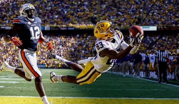Oct 14, 2017; Baton Rouge, LA, USA; LSU Tigers wide receiver Russell Gage (83) dives for a touchdown catch past Auburn Tigers defensive back Jamel Dean (12) during the second quarter of a game at Tiger Stadium. Photo Credit: Derick E. Hingle-USA TODAY Sports