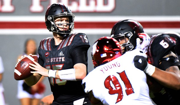 Oct 5, 2017; Raleigh, NC, USA; North Carolina State Wolfpack quarterback Ryan Finley (15) looks to pass during the second half against the Louisville Cardinals at Carter-Finley Stadium. The Wolfpack won 39-25.  Photo Credit: Rob Kinnan-USA TODAY Sports