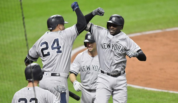 Oct 11, 2017; Cleveland, OH, USA; New York Yankees shortstop Didi Gregorius (18) celebrates with catcher Gary Sanchez (24) after hitting his second home run during the third inning of game five of the 2017 ALDS playoff baseball series against the Cleveland Indians at Progressive Field. Photo Credit: David Richard-USA TODAY Sports