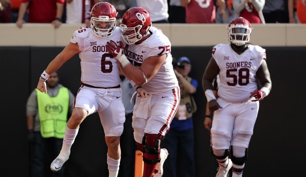 Nov 4, 2017; Stillwater, OK, USA; Oklahoma Sooners quarterback Baker Mayfield (6) celebrates with offensive lineman Dru Samia (75) after scoring a touchdown during the first half against the Oklahoma State Cowboys at Boone Pickens Stadium. Photo Credit: Kevin Jairaj-USA TODAY Sports