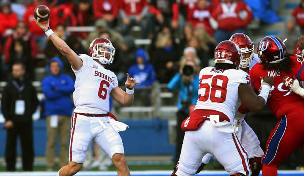 Nov 18, 2017; Lawrence, KS, USA; Oklahoma Sooners quarterback Baker Mayfield (6) throws a pass against the Kansas Jayhawks in the first half at Memorial Stadium. Photo Credit: Jay Biggerstaff-USA TODAY Sports