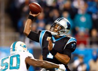 Panthers maul Fins behind Newton's 4 TD passes
