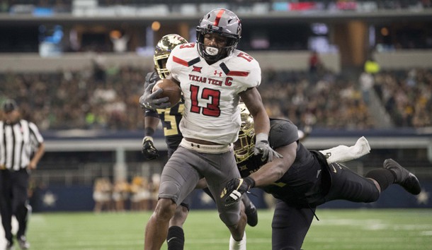 Nov 11, 2017; Arlington, TX, USA; Texas Tech Red Raiders wide receiver Cameron Batson (13) scores a touchdown against the Baylor Bears during the second half at AT&T Stadium. Photo Credit: Jerome Miron-USA TODAY Sports