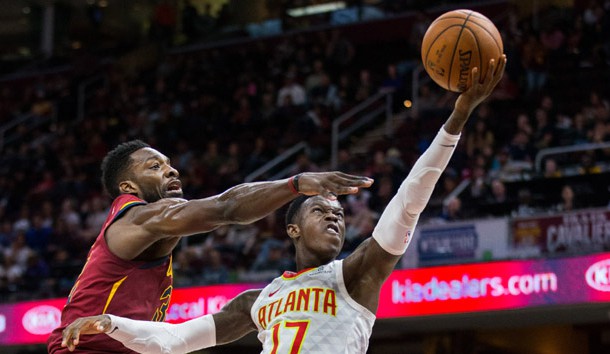 Nov 5, 2017; Cleveland, OH, USA; Atlanta Hawks guard Dennis Schroder (17) shoots the ball as Cleveland Cavaliers forward Jeff Green (left) pressures him during the fourth quarter at Quicken Loans Arena. The Hawks won 117-115. Photo Credit: Scott R. Galvin-USA TODAY Sports
