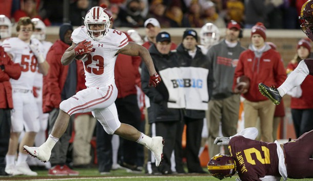 Nov 25, 2017; Minneapolis, MN, USA; Wisconsin Badgers running back Jonathan Taylor (23) scores a long touchdown during the fourth quarter of the Badgers 31-0 win over the Minnesota Golden Gophers at TCF Bank Stadium. Mike De Sisti/Milwaukee Journal Sentinel via USA TODAY NETWORK