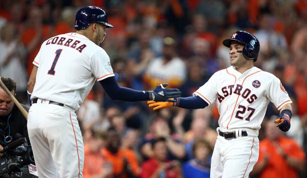 Oct 5, 2017; Houston, TX, USA; Houston Astros second baseman Jose Altuve (27) celebrates with shortstop Carlos Correa (1) after hitting a home run during the seventh inning against the Boston Red Sox in game one of the 2017 ALDS playoff baseball series at Minute Maid Park. Photo Credit: Troy Taormina-USA TODAY Sports