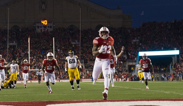 Nov 11, 2017; Madison, WI, USA; Wisconsin Badgers linebacker Leon Jacobs (32) returns a fumble for a touchdown during the third quarter against the Iowa Hawkeyes at Camp Randall Stadium. Photo Credit: Jeff Hanisch-USA TODAY Sports