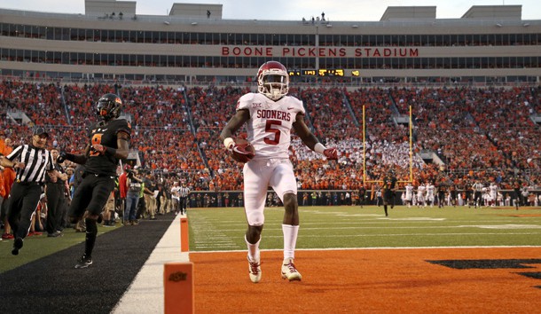 Nov 4, 2017; Stillwater, OK, USA; Oklahoma Sooners wide receiver Marquise Brown (5) scores a touchdown during the second half against the Oklahoma State Cowboys at Boone Pickens Stadium. Photo Credit: Kevin Jairaj-USA TODAY Sports
