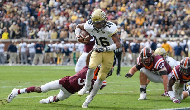 Nov 11, 2017; Atlanta, GA, USA; Georgia Tech Yellow Jackets quarterback TaQuon Marshall (16) breaks a tackle by Virginia Tech Hokies cornerback Greg Stroman (3) to score a touchdown during the first quarter at Bobby Dodd Stadium. Photo Credit: Dale Zanine-USA TODAY Sports