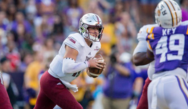 Troy Trojans quarterback Brandon Silvers (12) looks to pass the ball during the game between the LSU Tigers and the Troy Trojans at Tiger Stadium. Troy Trojans won 24-21. Photo Credit: Stephen Lew-USA TODAY Sports