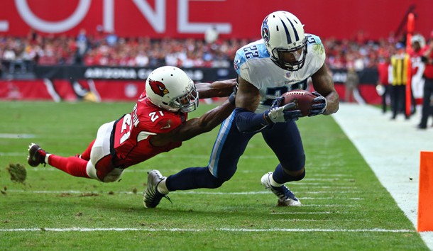 Dec 10, 2017; Glendale, AZ, USA; Tennessee Titans running back Derrick Henry (22) dives into the end zone to score a touchdown against Arizona Cardinals cornerback Patrick Peterson (21) in the second quarter at University of Phoenix Stadium. Photo Credit: Mark J. Rebilas-USA TODAY Sports