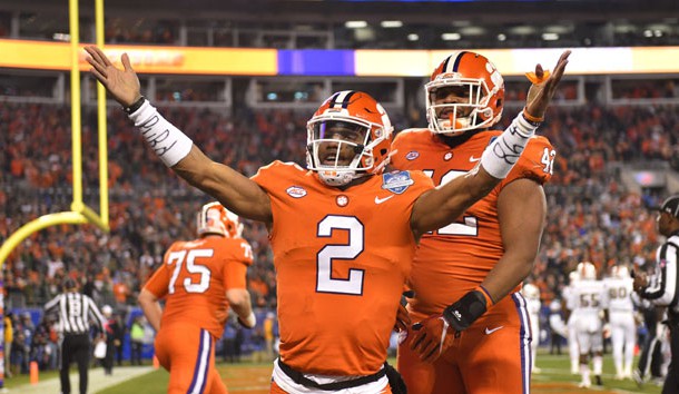 Dec 2, 2017; Charlotte, NC, USA; Clemson Tigers quarterback Kelly Bryant (2) celebrates with defensive lineman Christian Wilkins (42) after scoring a touchdown a touchdown in the first quarter in the ACC championship game at Bank of America Stadium. Photo Credit: Bob Donnan-USA TODAY Sports