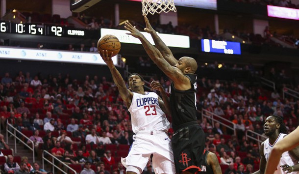 Dec 22, 2017; Houston, TX, USA; LA Clippers guard Lou Williams (23) shoots the ball as Houston Rockets forward PJ Tucker (4) defends during the fourth quarter at Toyota Center. Photo Credit: Troy Taormina-USA TODAY Sports