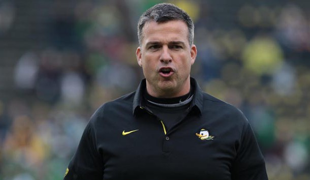 Nov 25, 2017; Eugene, OR, USA;  Mario Cristobal co-offensive coordinator and run-game coordinator for the Oregon Ducks walks onto the field before the game against the Oregon State Beavers at Autzen Stadium. Photo Credit: Scott Olmos-USA TODAY Sports