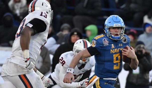 Dec 28, 2017; Annapolis, MD, USA;Navy Midshipmen quarterback Zach Abey (9) runs as Virginia Cavaliers linebacker Chris Peace (13) defends during the third quarter  in the 2017 Military Bowl at Navy-Marine Corps Memorial Stadium. Photo Credit: Tommy Gilligan-USA TODAY Sports