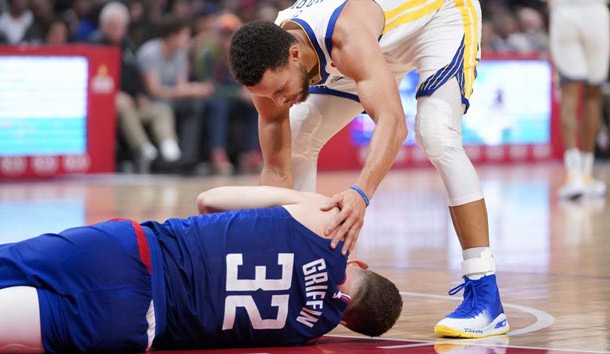 Jan 6, 2018; Los Angeles, CA, USA; Golden State Warriors guard Stephen Curry (30) looks over Los Angeles Clippers forward Blake Griffin (32) after Griffin was hurt on a play during the first half at Staples Center. Photo Credit: Kelvin Kuo-USA TODAY Sports