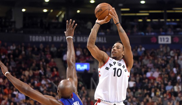 Jan 17, 2018; Toronto, Ontario, CAN;  Toronto Raptors guard DeMar DeRozan (10) shoots for a basket over Detroit Pistons forward Anthony Tolliver (43) in the second half at Air Canada Centre. Photo Credit: Dan Hamilton-USA TODAY Sports