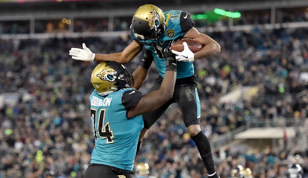 Dec 10, 2017; Jacksonville, FL, USA; Jaguars wide receiver Dede Westbrook (right) celebrates with  offensive tackle Cam Robinson (left) after scoring a touchdown against the Seattle Seahawks during the second half at EverBank Field. Photo Credit: Steve Mitchell-USA TODAY Sports