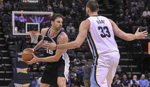 Jan 24, 2018; Memphis, TN, USA; San Antonio Spurs center Pau Gasol (16) handles the ball against Memphis Grizzlies center Marc Gasol (33) during the second half at FedExForum. the San Antonio Spurs defeat Memphis Grizzlies 108-85. Photo Credit: Justin Ford-USA TODAY Sports