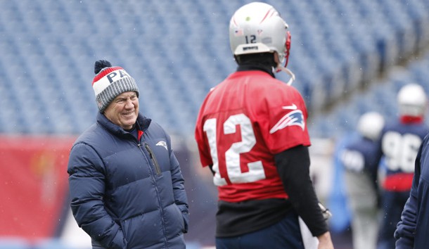 Jan 17, 2018; Foxborough, Massachussetts, USA; New England Patriots head coach Bill Belichick talks with quarterback Tom Brady (12) during practice before the AFC Press Conference at Gillette Stadium. Photo Credit: Greg M. Cooper-USA TODAY Sports