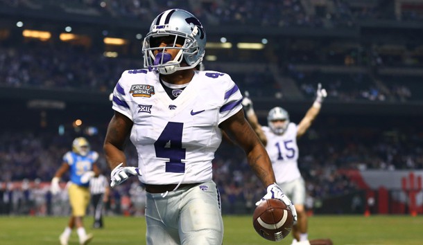 Dec 26, 2017; Phoenix, AZ, USA; Kansas State Wildcats wide receiver Dominique Heath (4) scores a touchdown against the UCLA Bruins in the third quarter of the 2017 Cactus Bowl at Chase Field. Photo Credit: Mark J. Rebilas-USA TODAY Sports