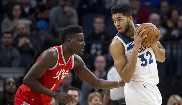 Feb 13, 2018; Minneapolis, MN, USA; Minnesota Timberwolves center Karl-Anthony Towns (32) looks to get around Houston Rockets forward Luc Mbah a Moute (12) in the first half at Target Center. Photo Credit: Jesse Johnson-USA TODAY Sports