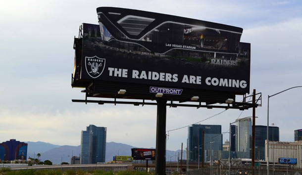 May 31, 2017; Paradise, NV, USA: General overall view of billboard that reads "The Raiders Are Coming" at the construction site of Las Vegas Stadium. The domed stadium will be the home of the Las Vegas Raiders and the UNLV Rebels football team. It is located on about 62 acres west of Mandalay Bay at Russell Road and Hacienda Avenue and between Polaris Avenue and Dean Martin Drive, just west of Interstate 15. Construction of the $1.9 billion stadium is planned to begin in 2017 and be completed for the 2020 NFL season. NFL owners voted 31-1 to allow Raiders owner Mark Davis to relocate the franchise from Oakland to Las Vegas. Photo Credit: Kirby Lee-USA TODAY Sports