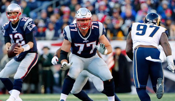 Dec 4, 2016; Foxborough, MA, USA;  New England Patriots tackle Nate Solder (77) blocks for New England Patriots quarterback Tom Brady (12) against the Los Angeles Rams during the first half at Gillette Stadium. Photo Credit: Winslow Townson-USA TODAY Sports